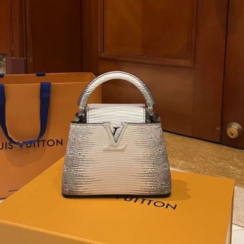 LV capucines lizard skin