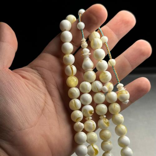 مسباح مستكه شبيه الكهرمان جبس بعسل