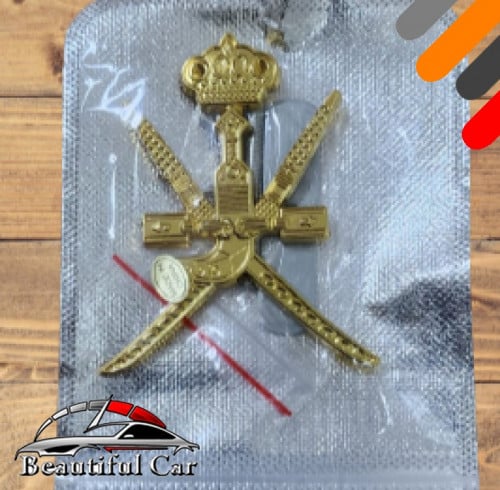 شعار عمان حديد للشبك - ذهبي