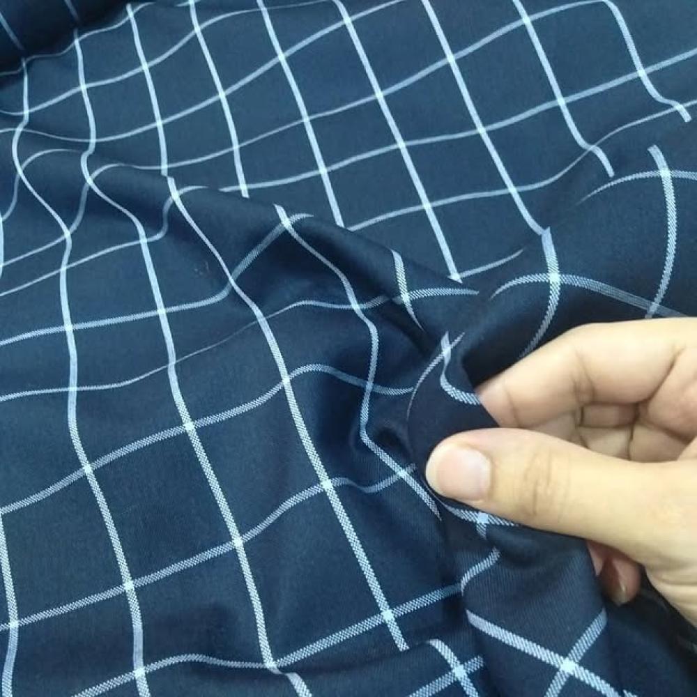 أقمشة الكاروهات موضة لا تنتهي.. تألقي بها في إطلالتك الشتوية