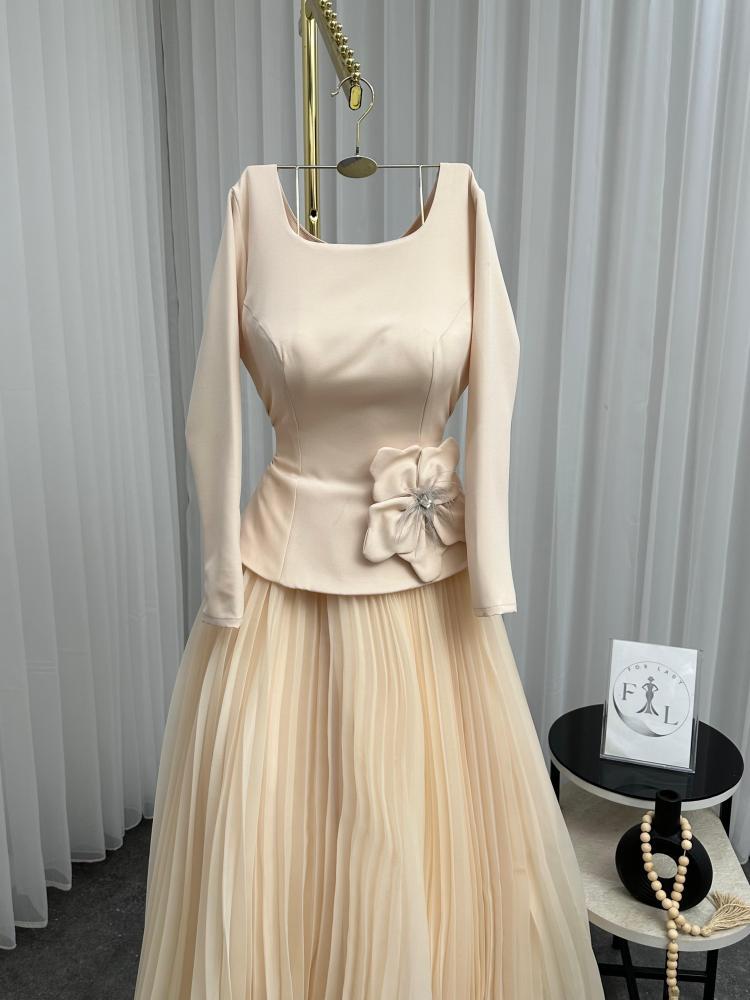 فستان سهرة مكسر اورجنزا بتكسيره أنيقة