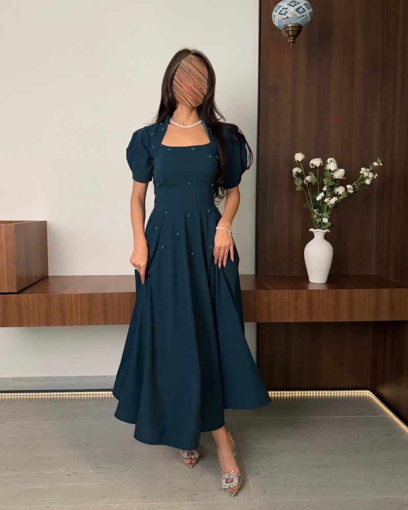 فستان ميد راقي بشكل جديد