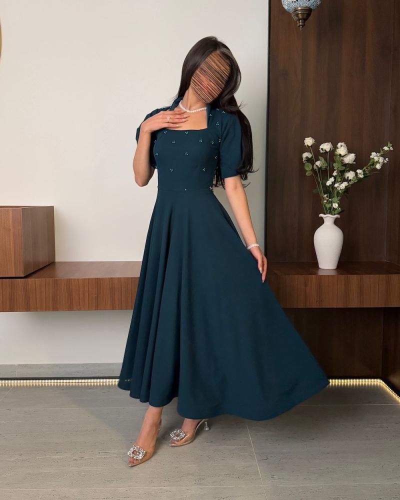 فستان ميد راقي بشكل جديد