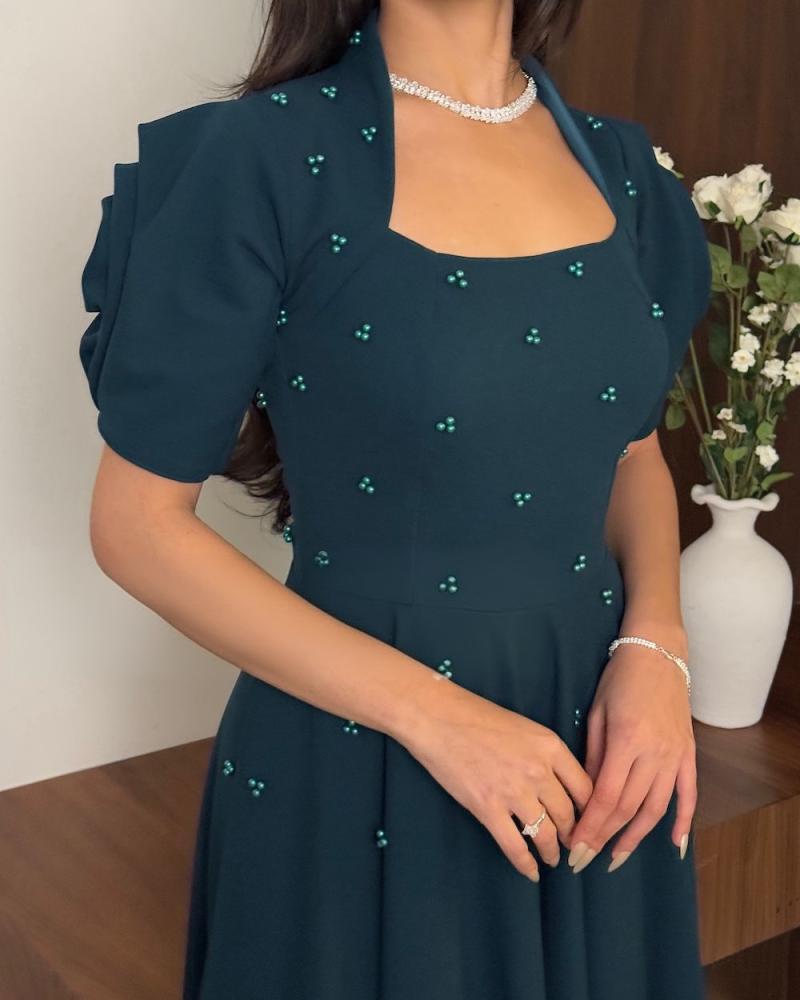 فستان ميد راقي بشكل جديد