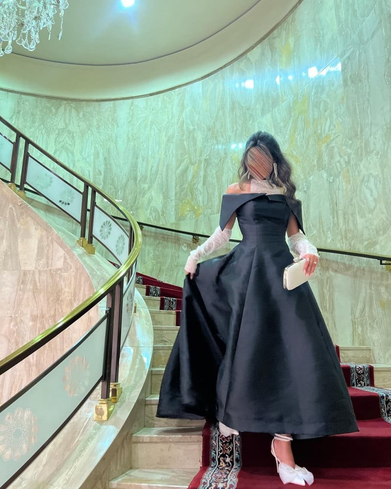 فستان سهرة اسود باكمام جذابه