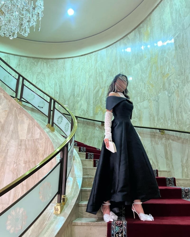 فستان سهرة اسود باكمام جذابه
