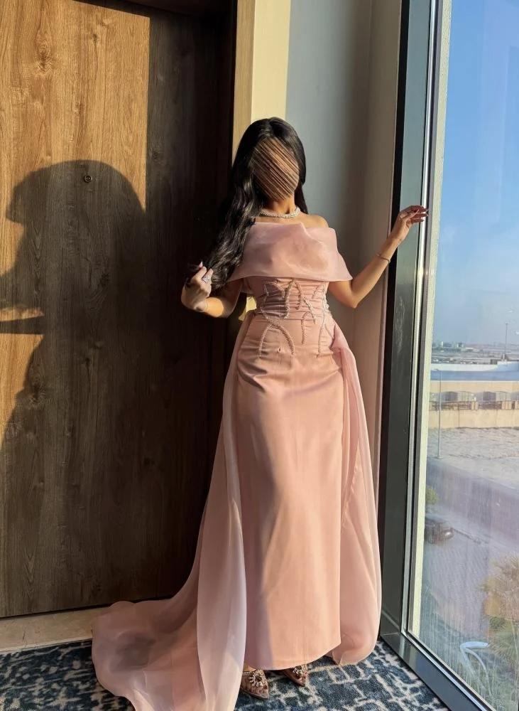 فستان سهرة بخامة اورجانزا وردي أنيق