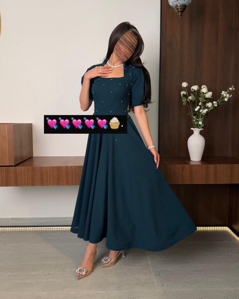 فستان ميد راقي بشكل جديد