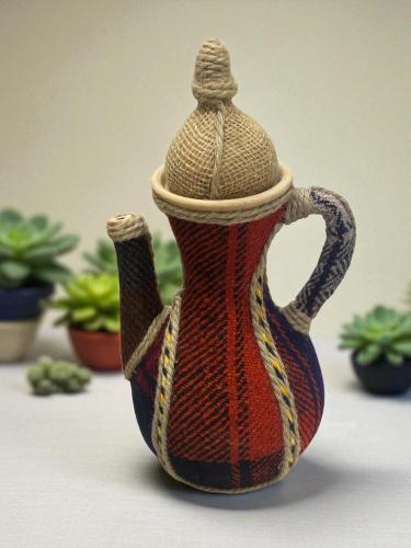 جرة فخارية بسعة(1,5لتر) ملبسة