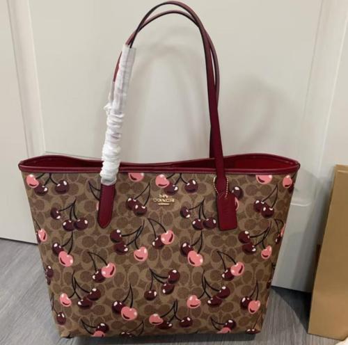 Coach ( كوتش تشيري عنابي بني )