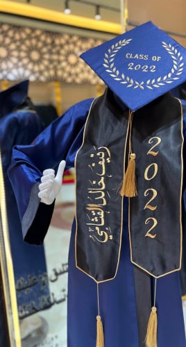 روب تخرج القماش تفته ستان كحلي ومخطط بنفس القماش ا...