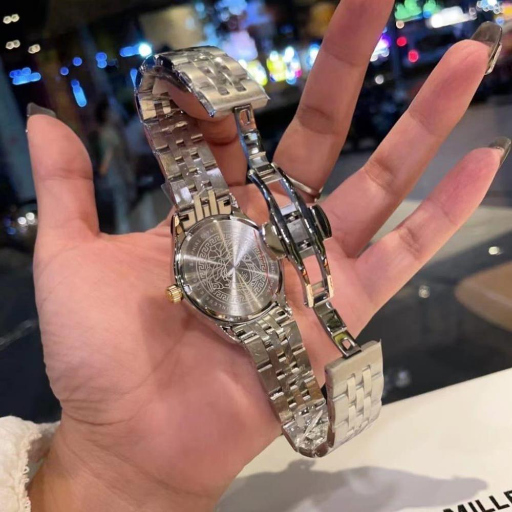 ساعة فرزاتشي ذهبي بفضي ابيض