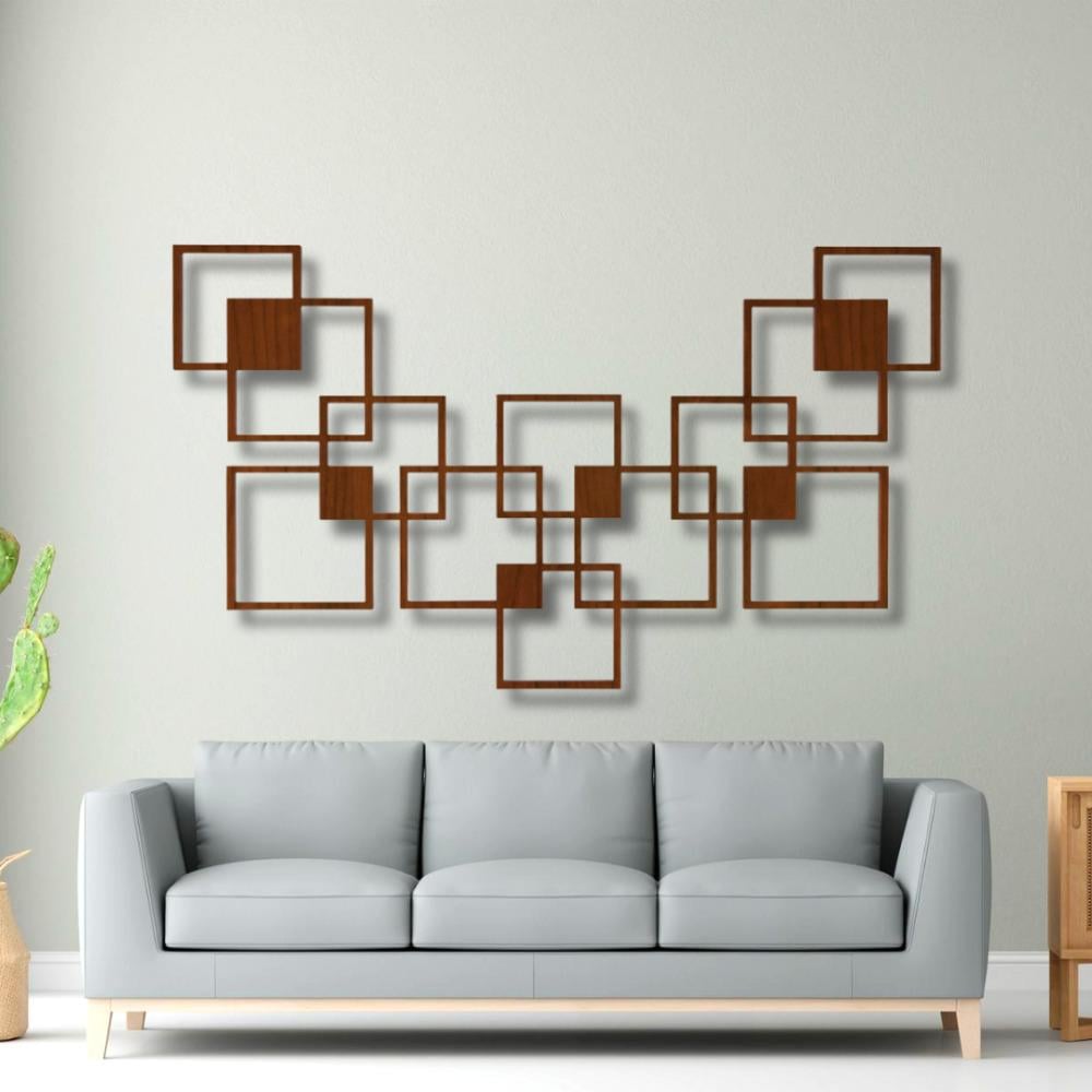 5 لوحات جدارية خشبية يمكن أن تغير ديكور غرفة المعيشة بالكامل