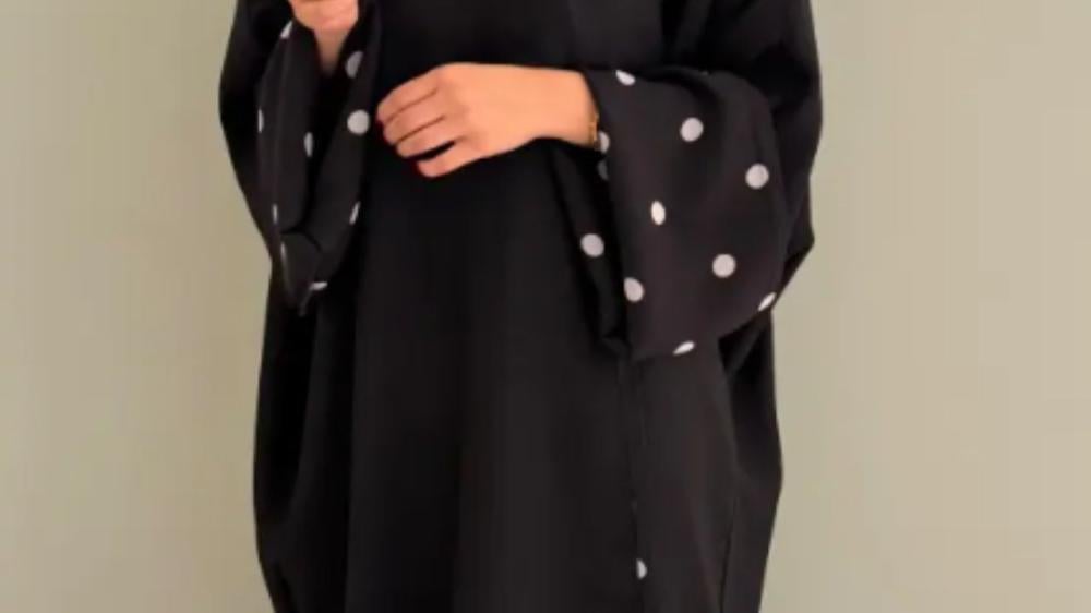 عبايات سوداء كم واسع