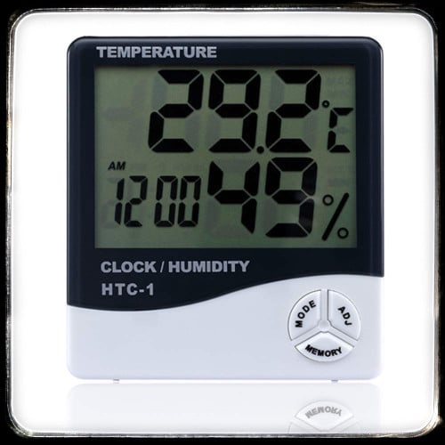 جهاز قياس الحراره فيه الغرفه يعرض درجه الحراره - درجه الرطوبه - الساعه -
