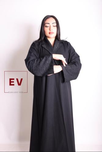 ريم عباية جوخ اسود وأكمام وياقة من الجاكار قصة بلي...