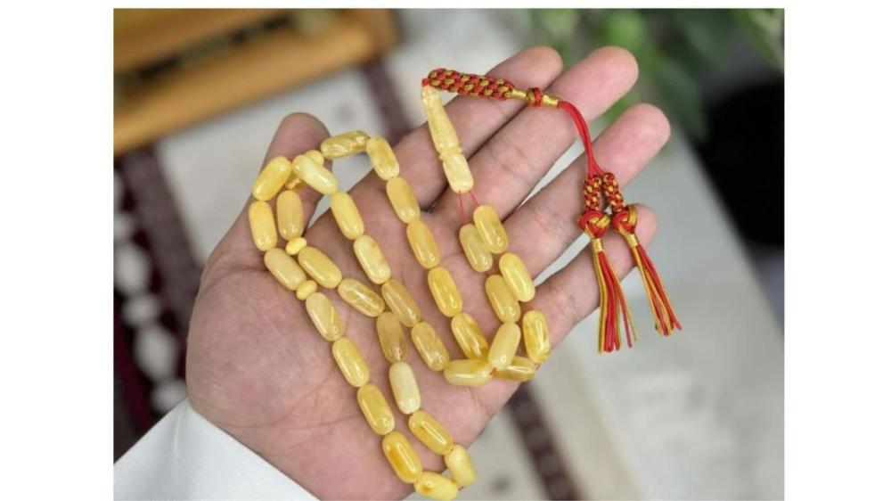 أفضل أنواع سبحة كهرمان: اكتشف تشكيلات الكهرمان بالصور لتناسب شخصيتك. د