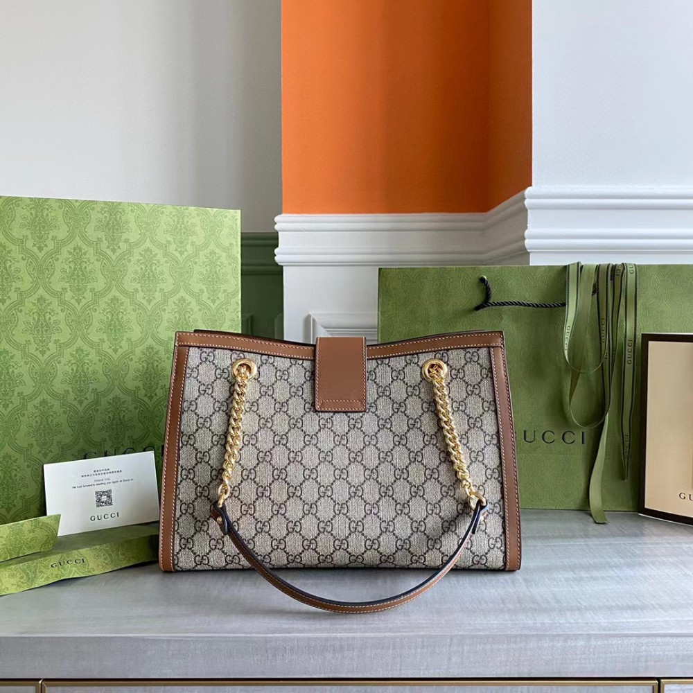 Padlock leather-trimmed printed coated-canvas tote