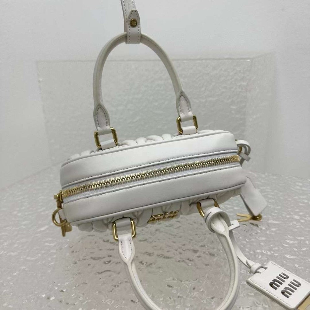 Matelassé Leather Top Handle Bag