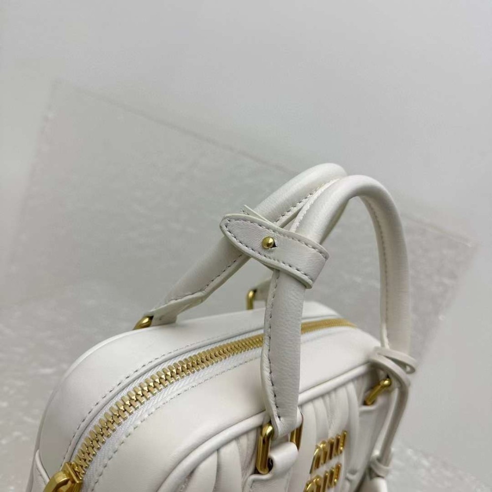 Matelassé Leather Top Handle Bag
