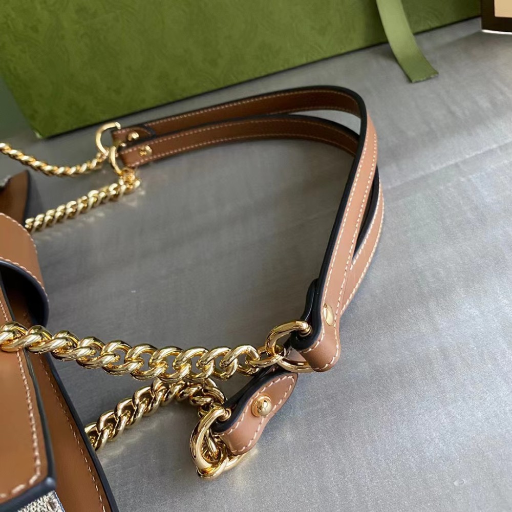 Padlock leather-trimmed printed coated-canvas tote