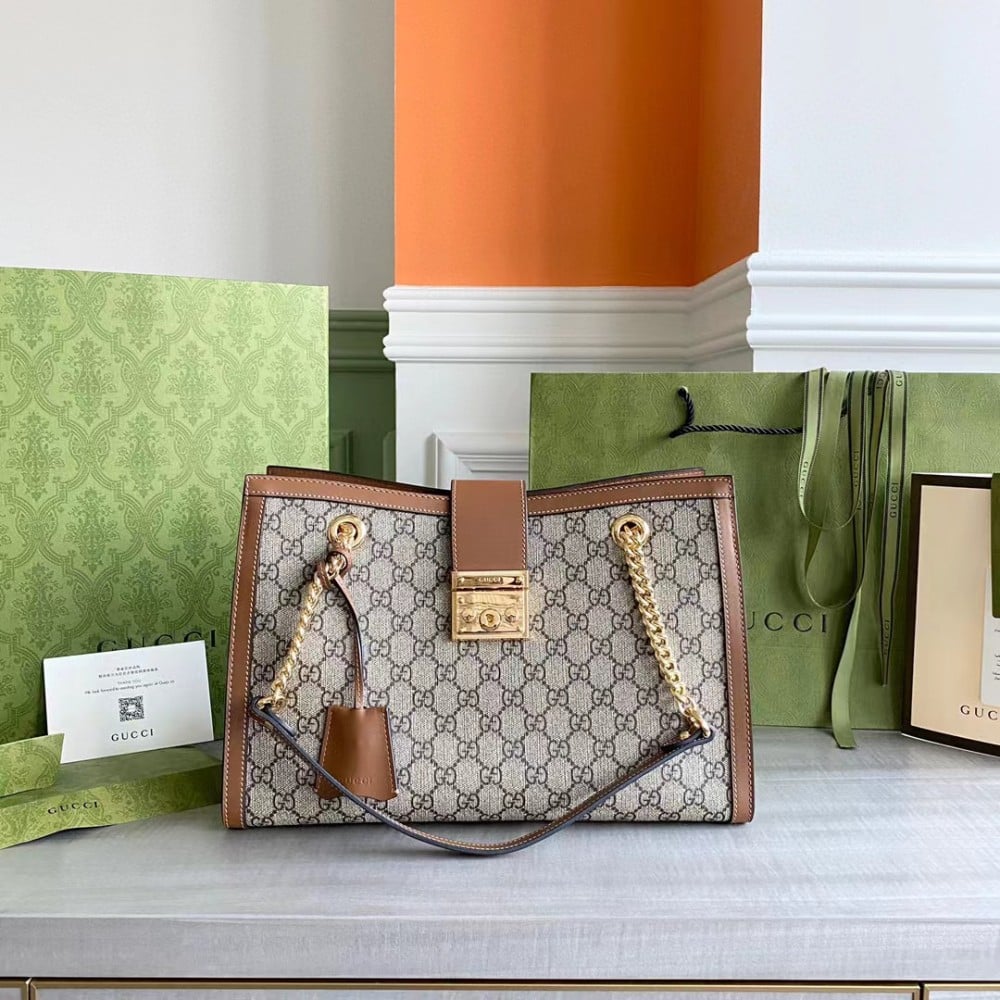 Padlock leather-trimmed printed coated-canvas tote