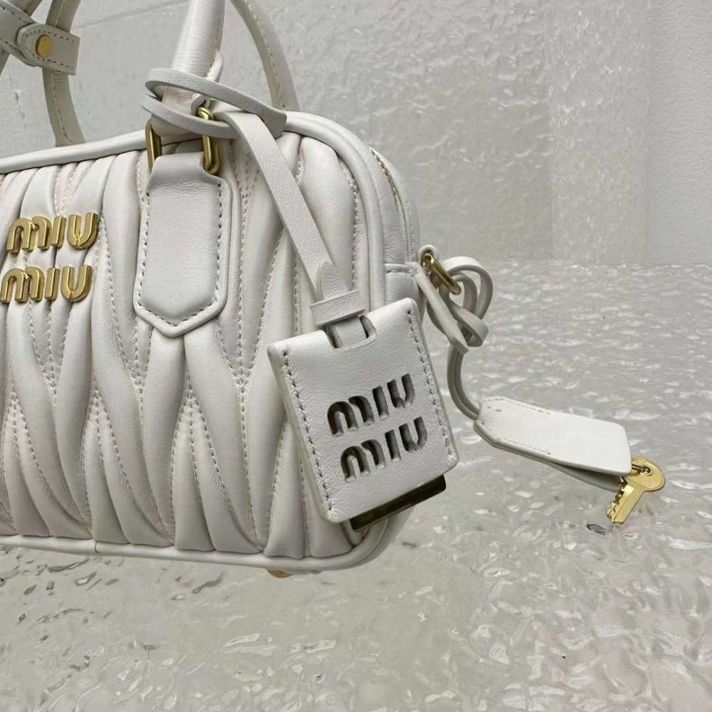Matelassé Leather Top Handle Bag