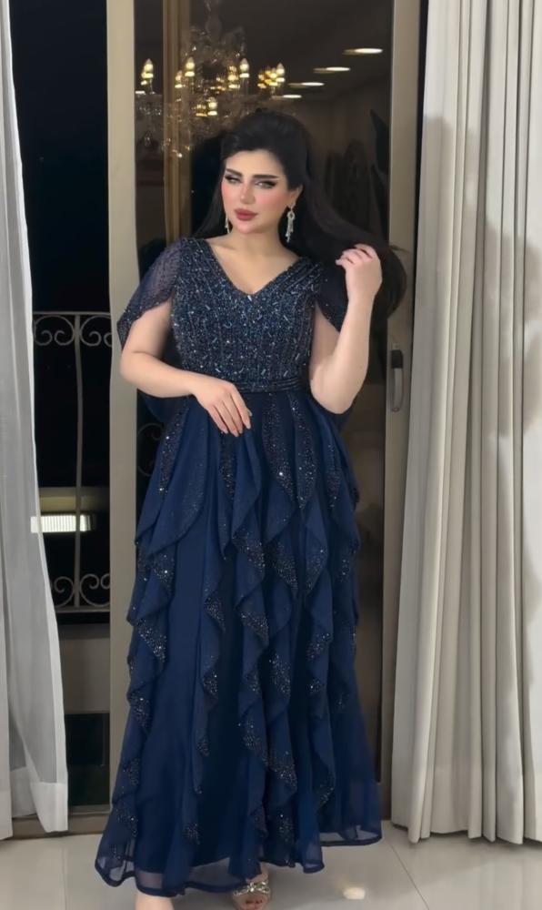 فستان سهرة  كحلي مموج تطريز يدوي فخم