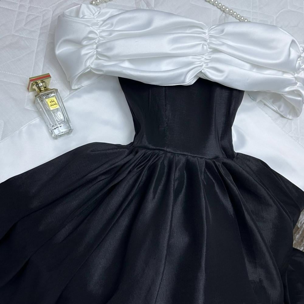 فستان سهرة  دبل كلوش صدريه وذيل تفته كوري راقي