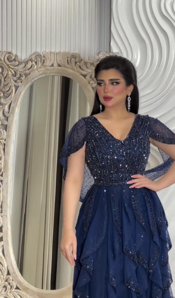 فستان سهرة  كحلي مموج تطريز يدوي فخم