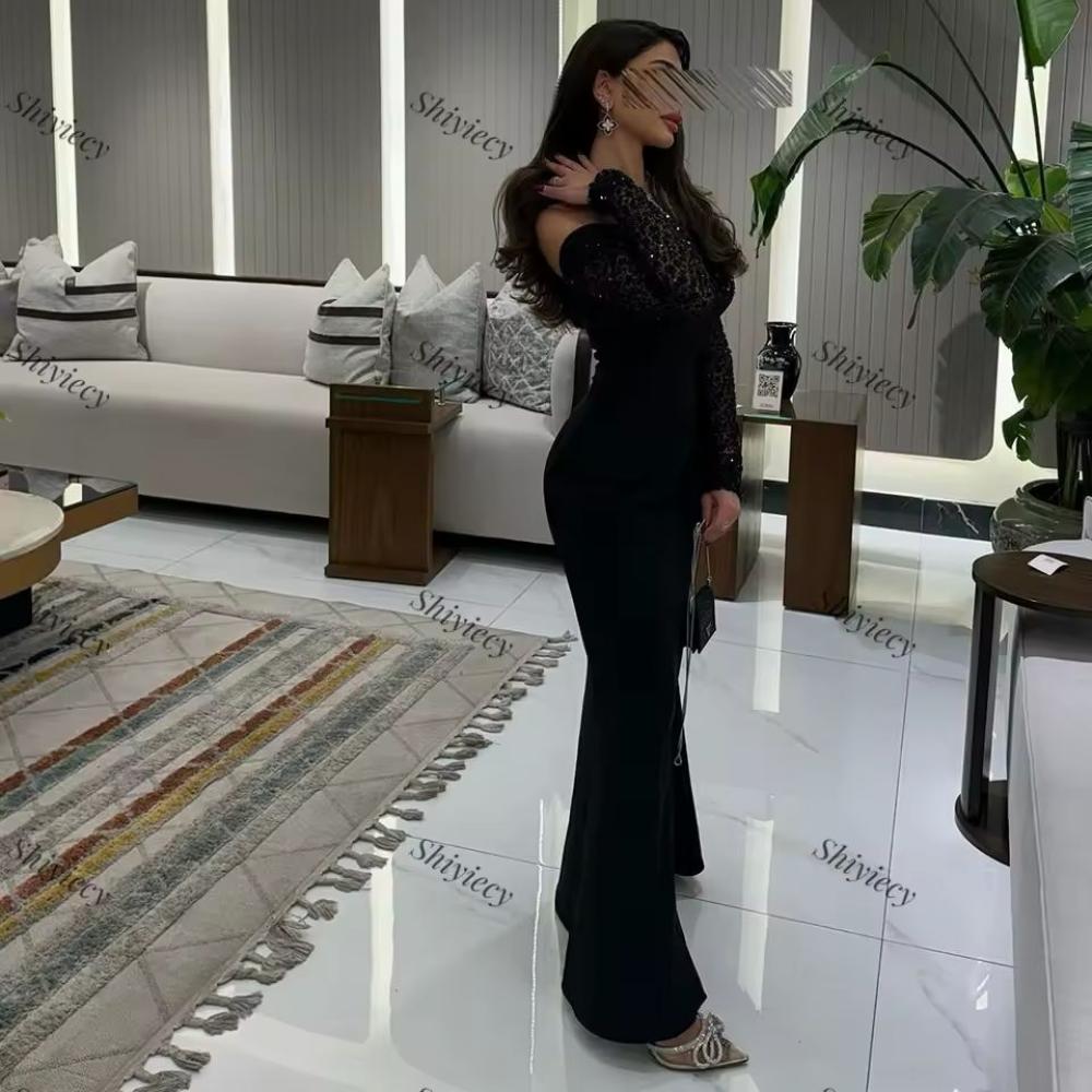 فستان سهرة اسود باكمام طويله