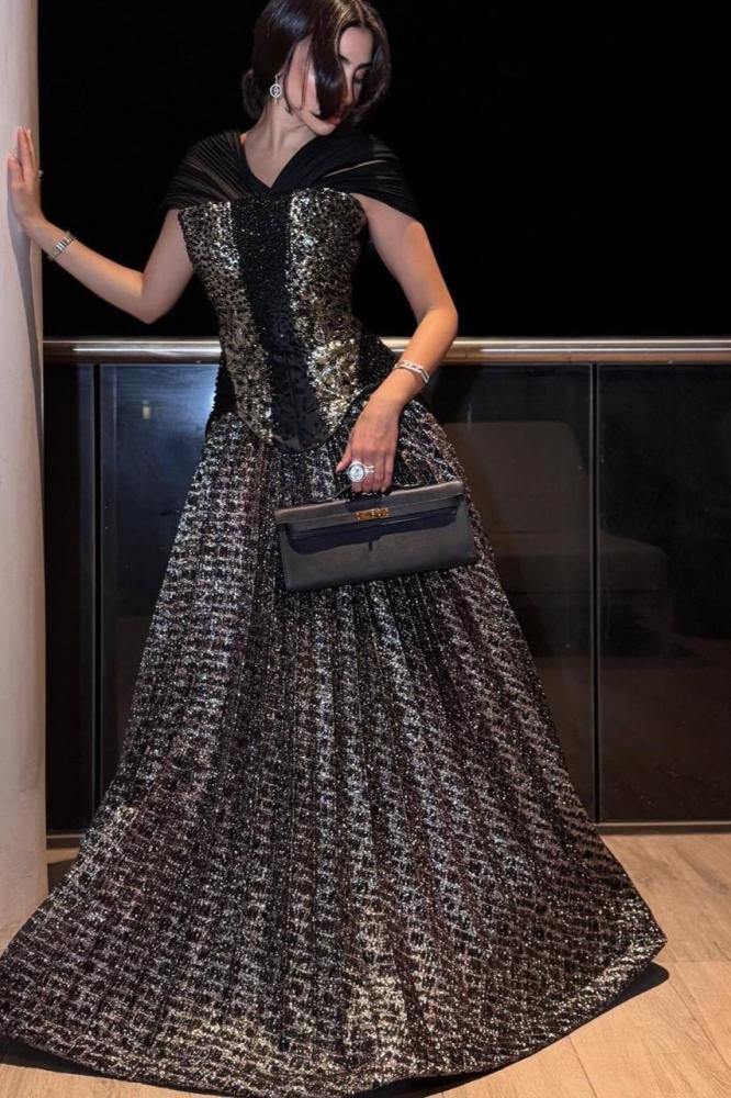 فستان سهرة أوف شولد لون اسود