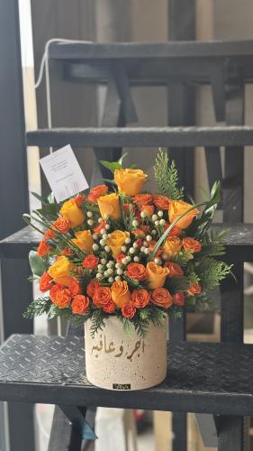 orange rose vase