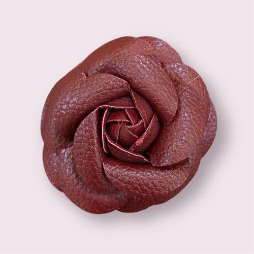 Maroon camellia flower