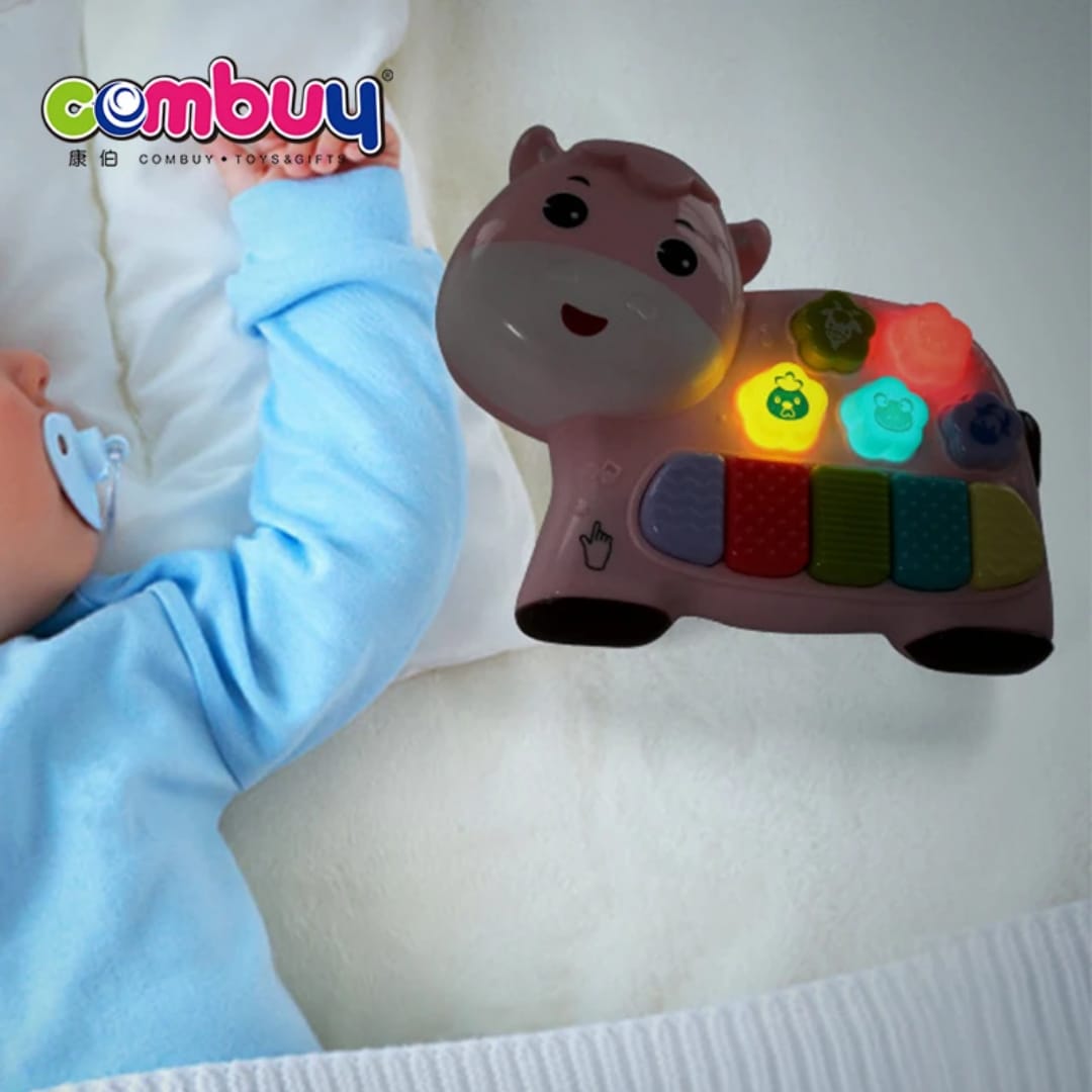 بيانو الأطفال اللطيف على شكل بقرة (Cute Piano) - أصوات حيوانات مضحكة وإضاءة تفاعلية!