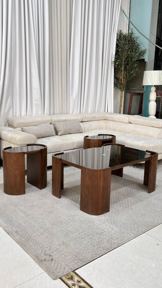 Standard walnut veneer table set with a clear glass top - brown color