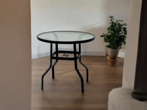 طاولة دائري زجاج شفاف اسود F5024