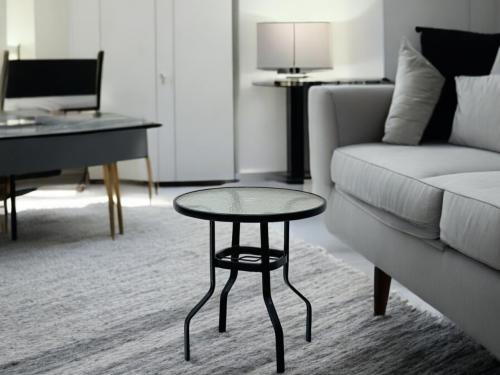 طاولة دائري زجاج شفاف اسود f 5024