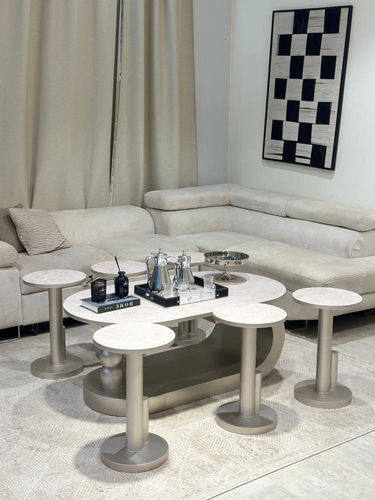 Wave table set with a sturdy base in champagne color, including 6 serving pieces.