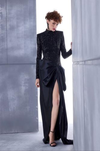 فستان سيكونز أسود بقصة سفلية وفيونكة