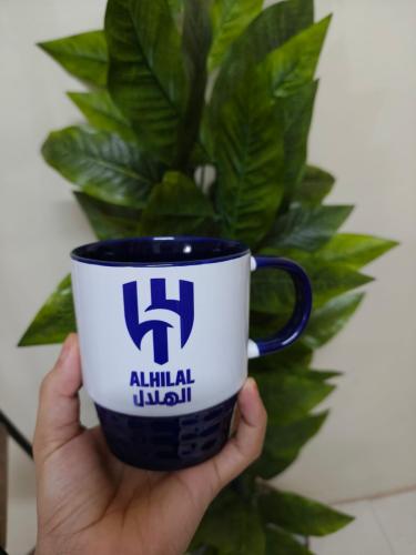 كوب بشعار نادي الهلال