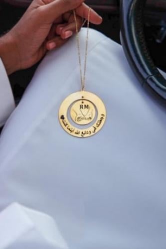تعليقة سيارة بالاسم