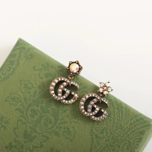 قوتشي earring