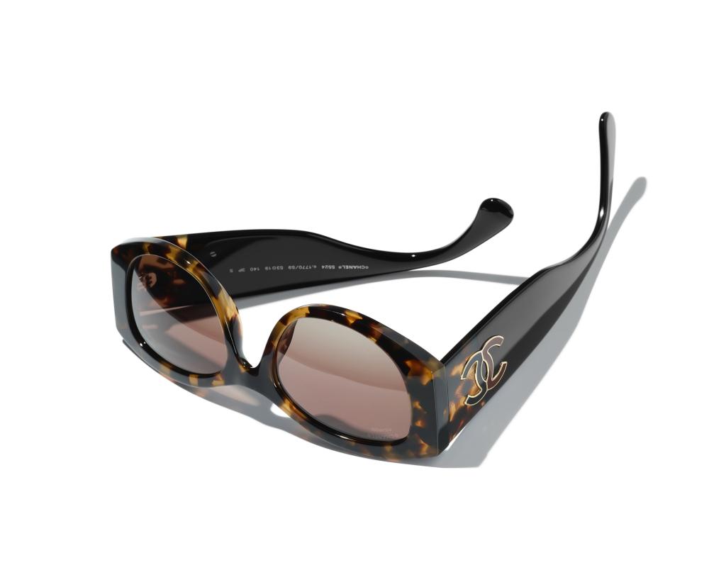 Chanel Black Tiger Oval Frame Sunglasses - TEBOUGIE
