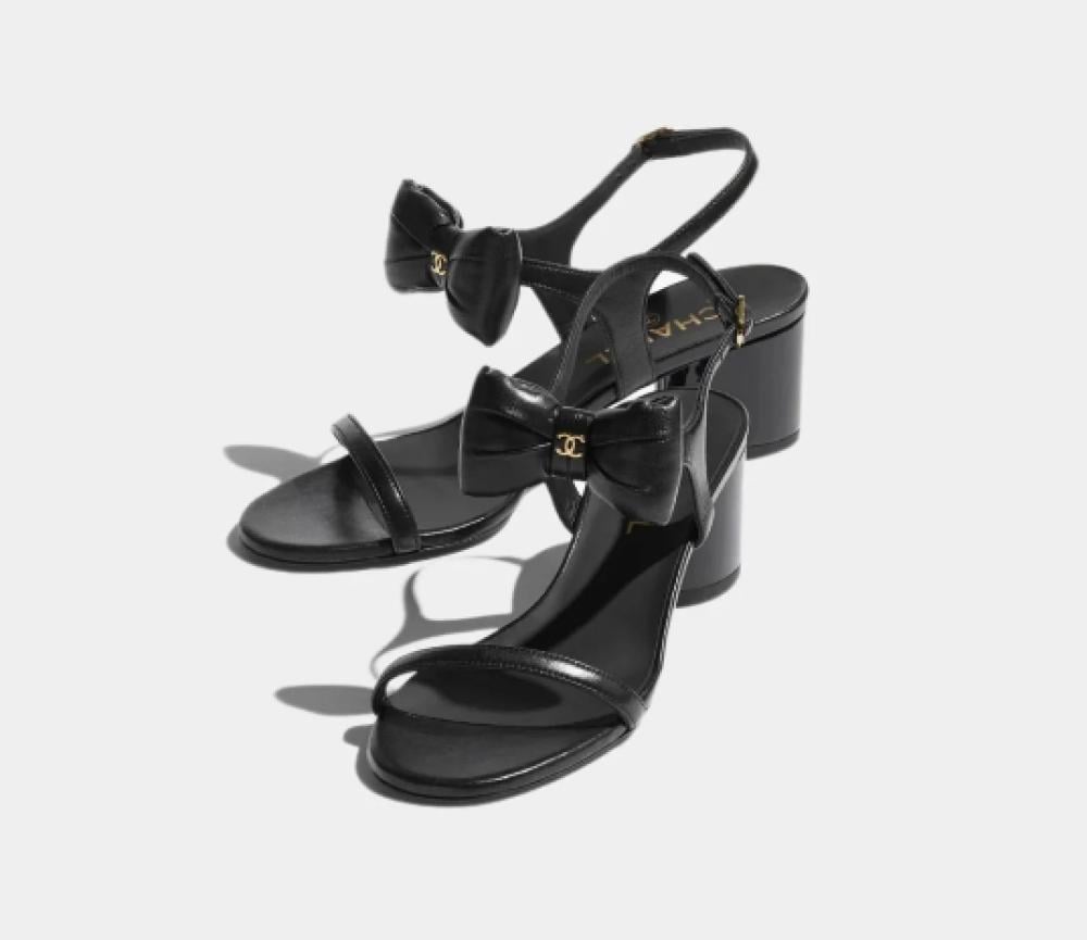 靴 Chanel tweed bow sandals Chanel Black Puffy Bow Sandals