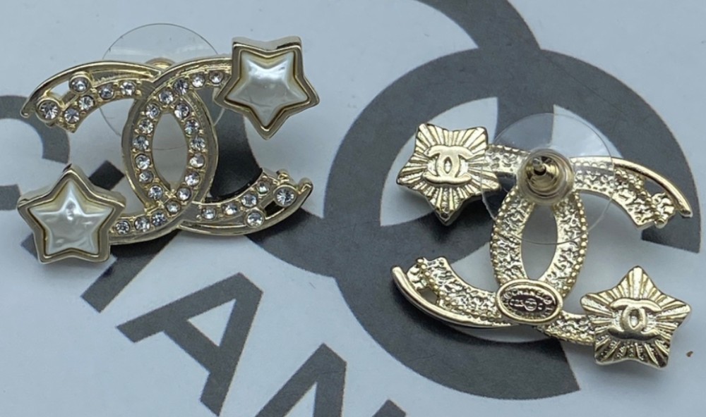 2024 Chanel earrings, a gold stud with the Chanel logo and