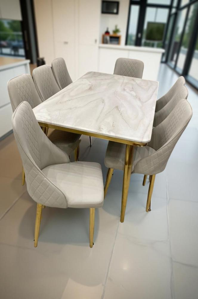 طاولة طعام رخام ستيل ذهبي 8 كرسي جلد