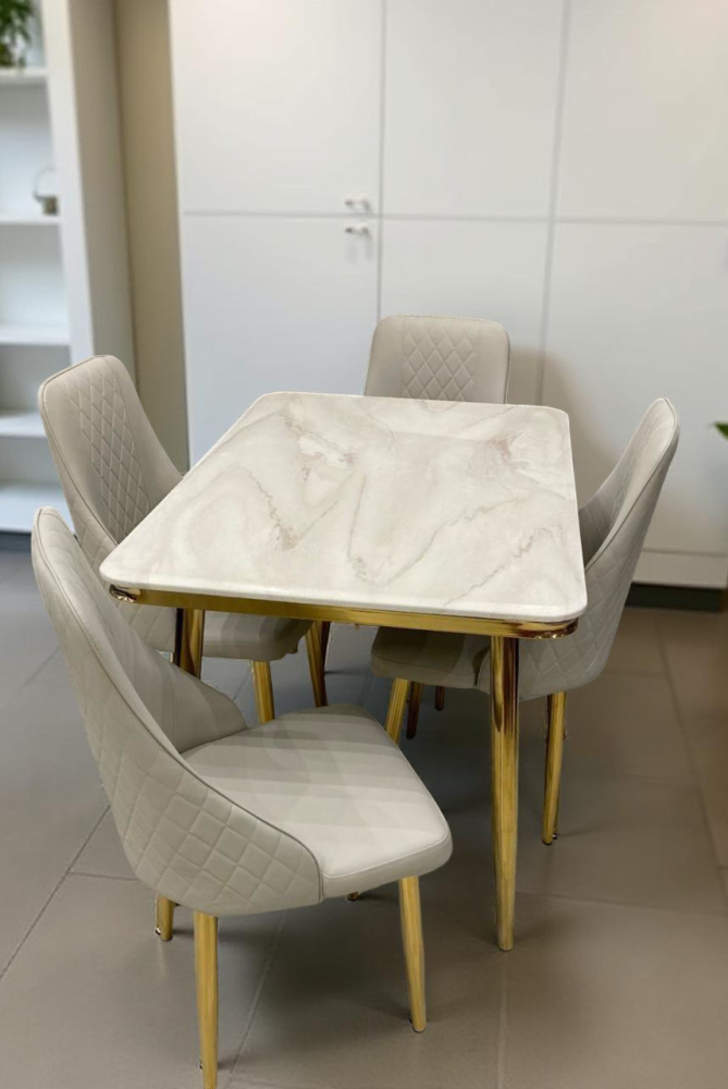 طاولة طعام رخام ستيل ذهبي 4 كرسي جلد