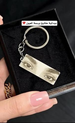 ميداليه بحفر وطباعه صوره عيون