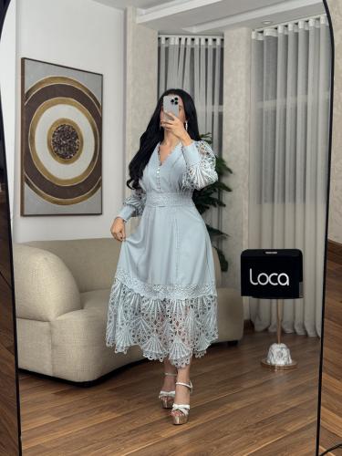 فستان ناعم وبنقوش مميزه باللون السماوي من لوكا فاش...